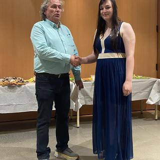 Fish and Aqua student receiving an award in 2024