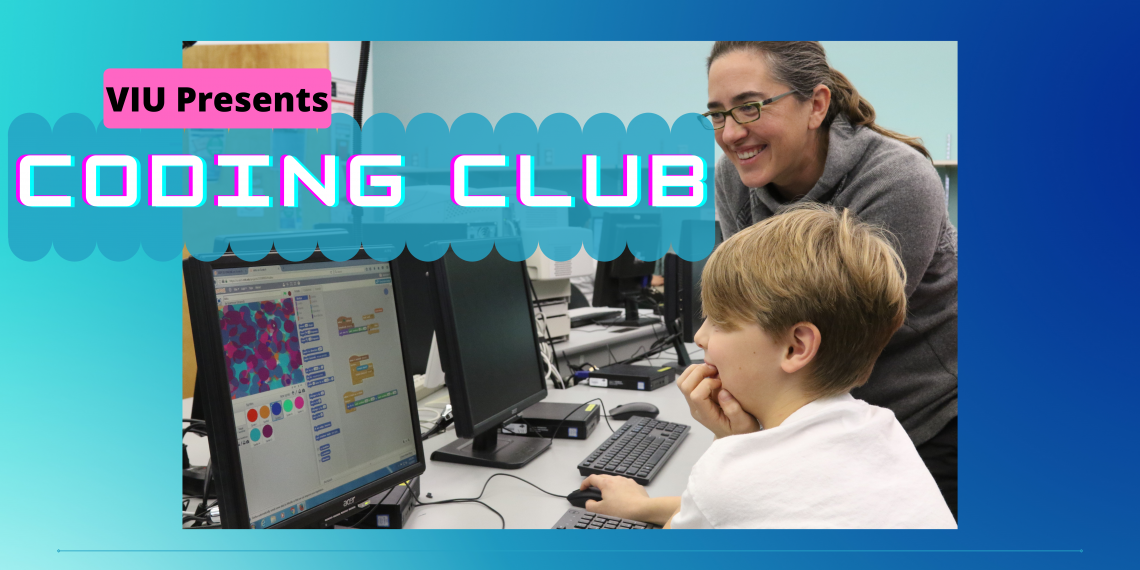 Teacher and student looking at computer